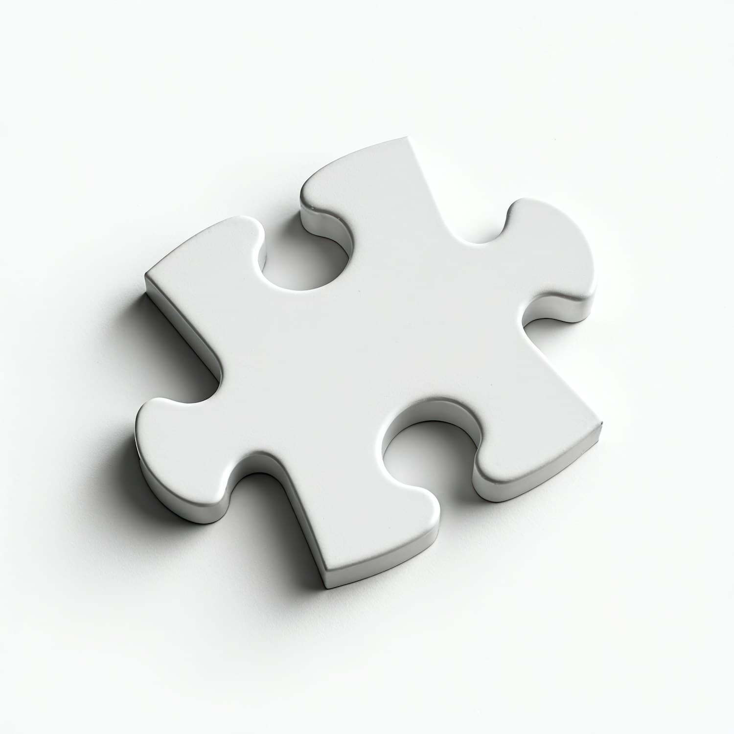 Ein einzelnes weißes Puzzleteil auf hellem Grund